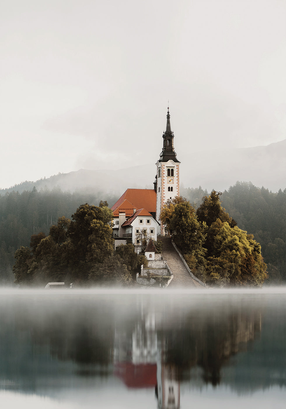 A Church On An Island In The Middle Of Lake Bled Plakat