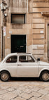 Classic Car in Urban Setting Plakat - Posterbox.dk