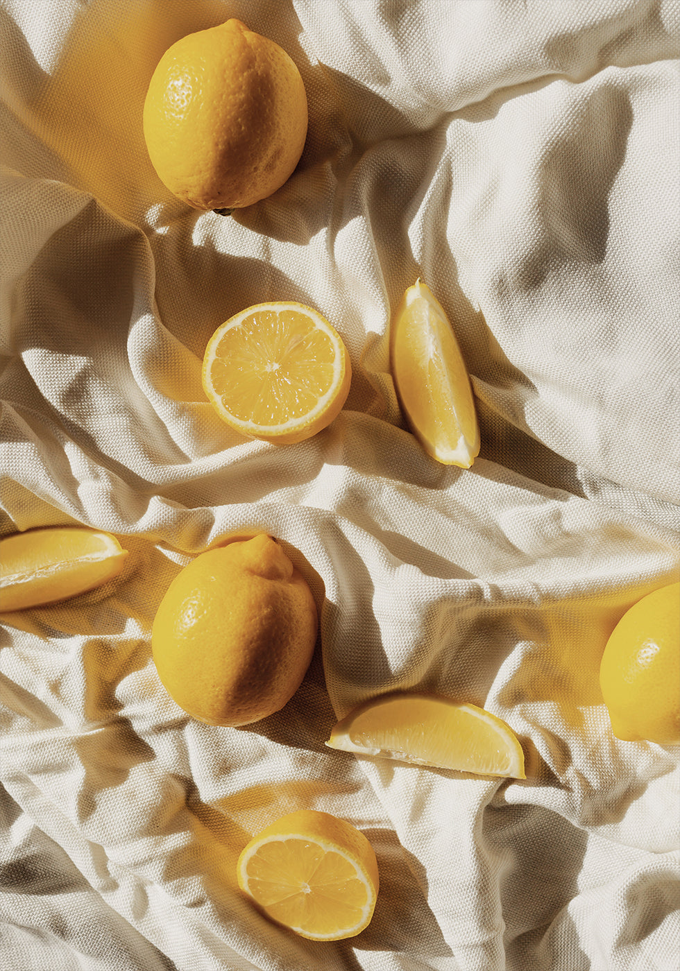 Vibrant Lemons on Textured Fabric Plakat - Posterbox.dk