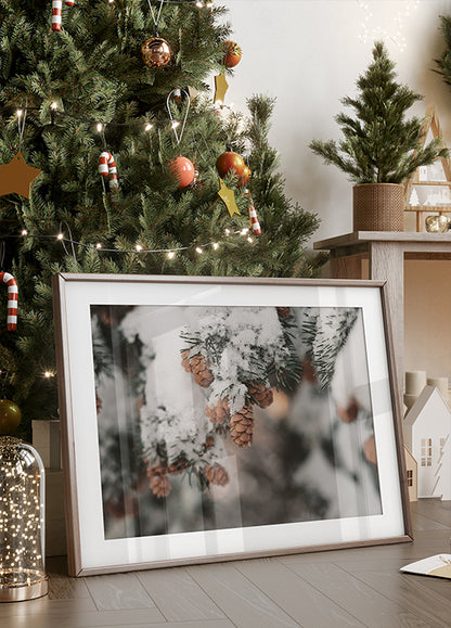 Snow-Covered Branch with Pine Cones Plakat