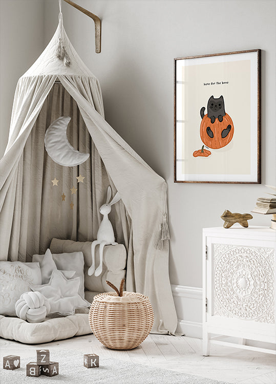 Black Cat Playfully Sitting In A Pumpkin