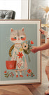 Cat in Floral Dress Holding Flowers Plakat - Posterbox.dk