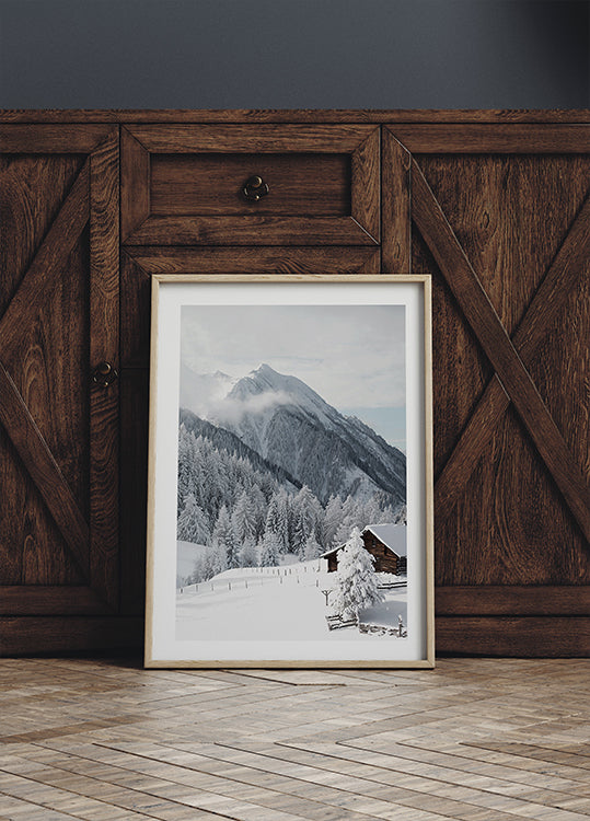 Snow-Covered Cabin in the Alps Plakat - Posterbox.dk